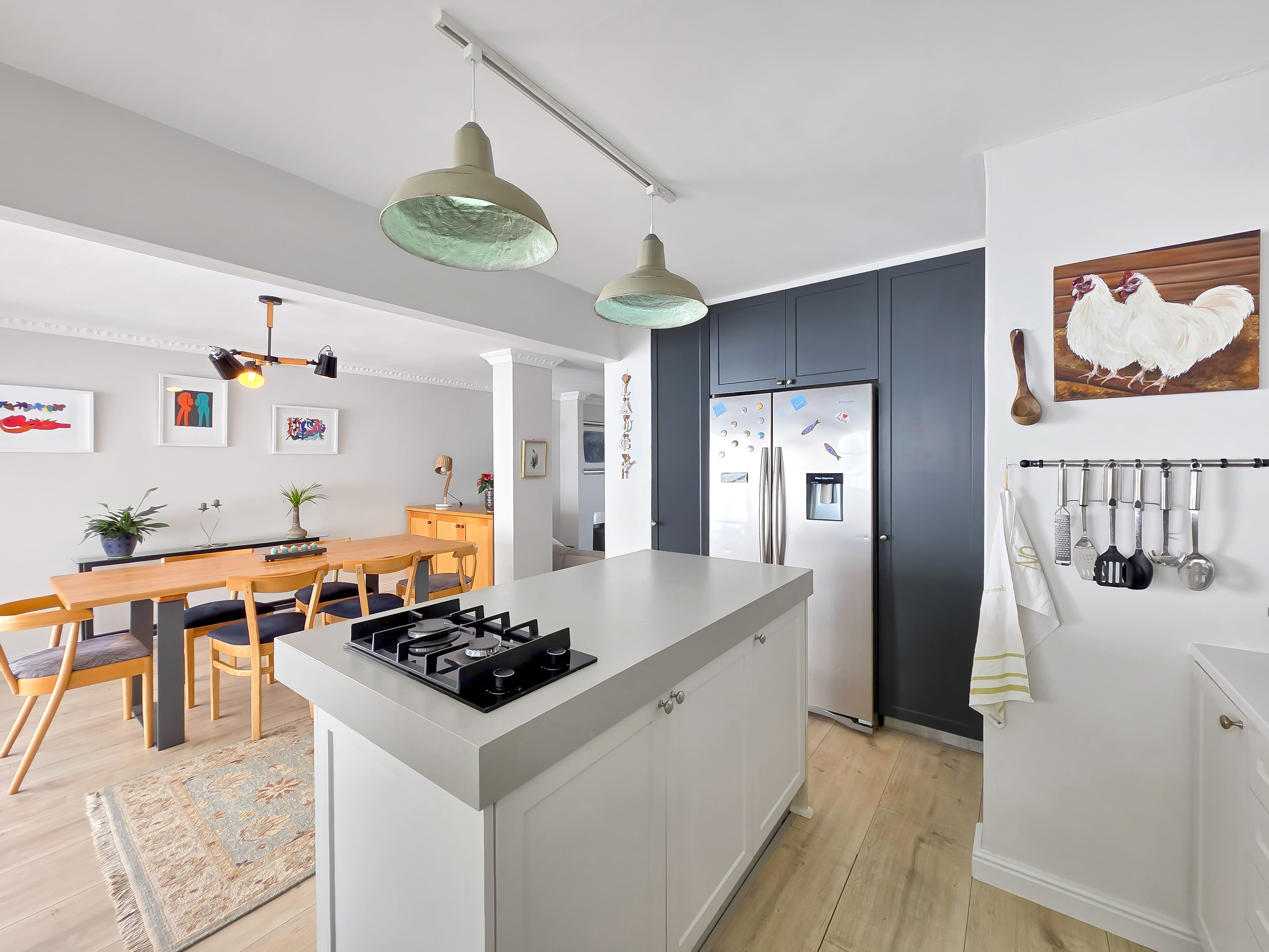 The kitchen with fridge and freezer.