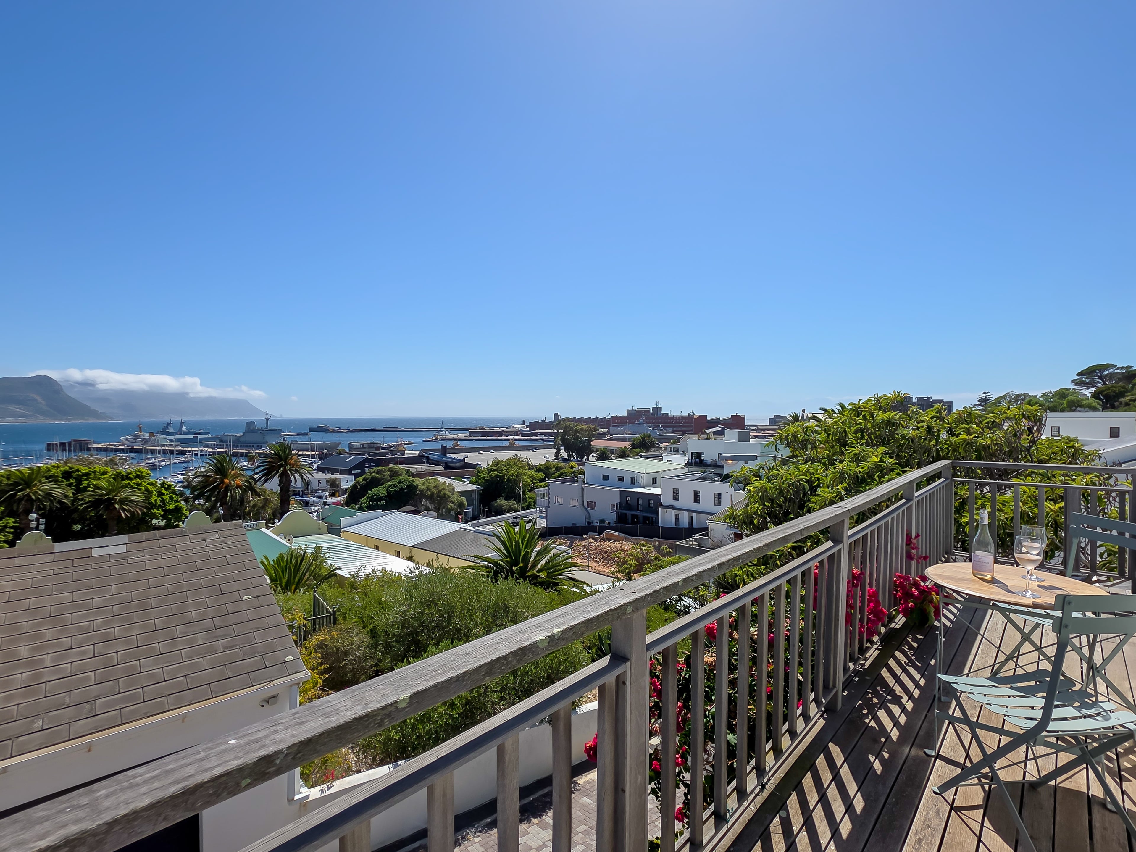 The view from the master bedroom balcony over the harbour, yacht basin and village below.